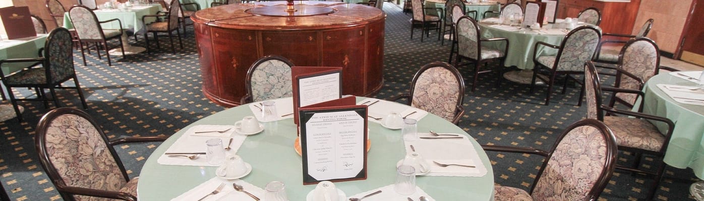 Dining area with tables set for a meal