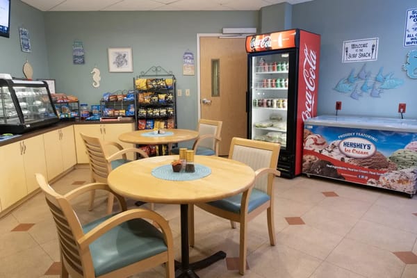 Interior view of a dining area with tables and amenities
