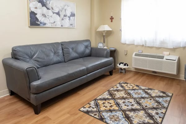 Cozy interior of a resident living room with a sofa