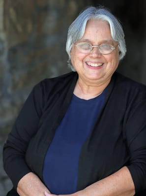 Happy senior woman smiling outdoors