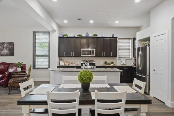 Bright interior of a common area with a dining table