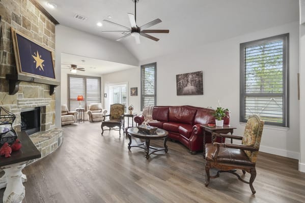 Bright interior common area with seating and plants