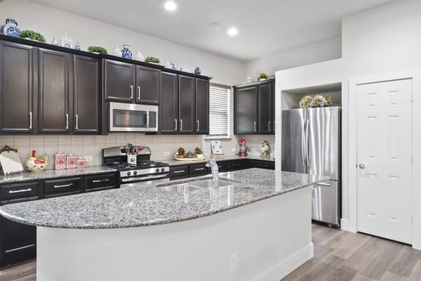 Bright kitchen area with modern appliances