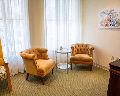 Comfortable seating area with two armchairs and a table