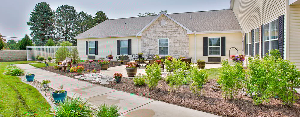 Serene garden area with seating and flowers