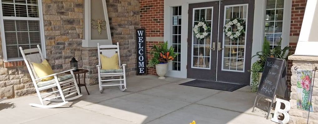 Welcoming entrance with rocking chairs and decor
