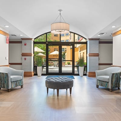 Bright common area with seating in a senior living facility