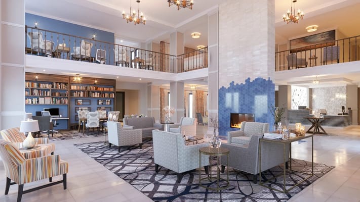 Interior view of a bright common area with seating