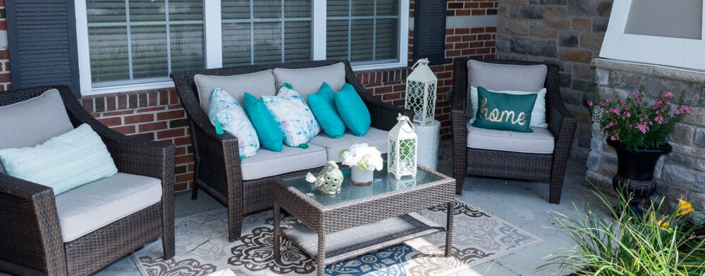 Outdoor seating area with colorful cushions and decor
