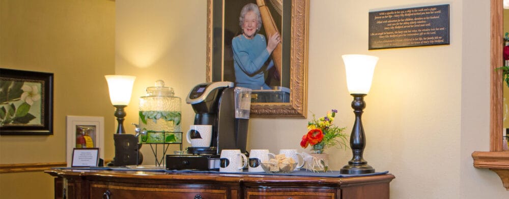 Interior scene featuring a coffee station and resident