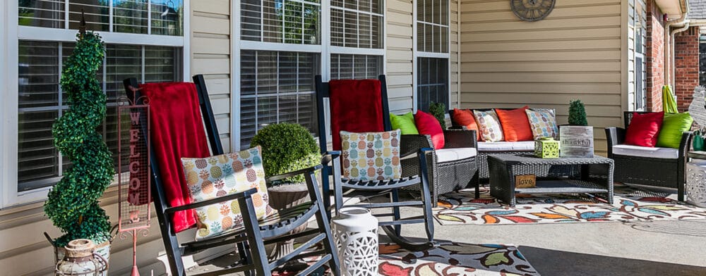 Welcoming outdoor seating area with rocking chairs