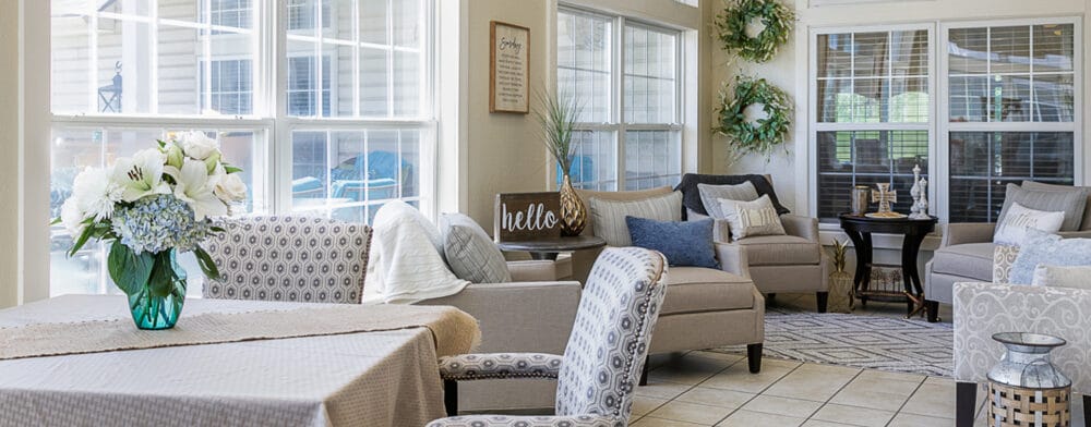 A cozy common area with comfortable seating and decor