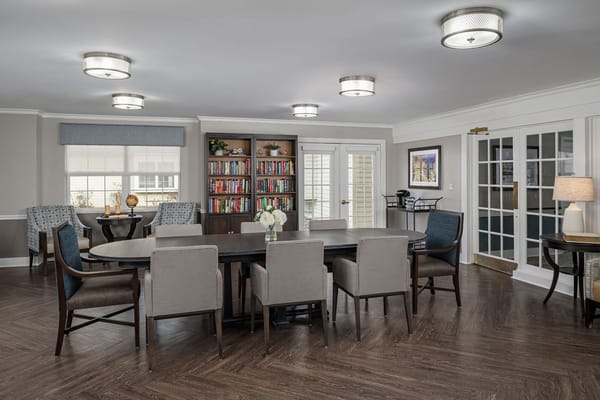 Common area with seating and bookshelves