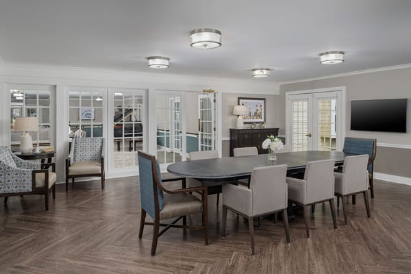 Interior common area with dining table and chairs