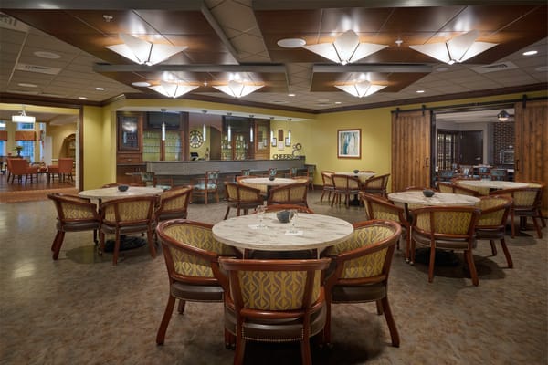 Dining area with round tables and comfortable seating