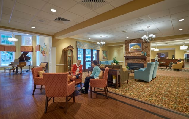 Residents socializing in a cozy common area