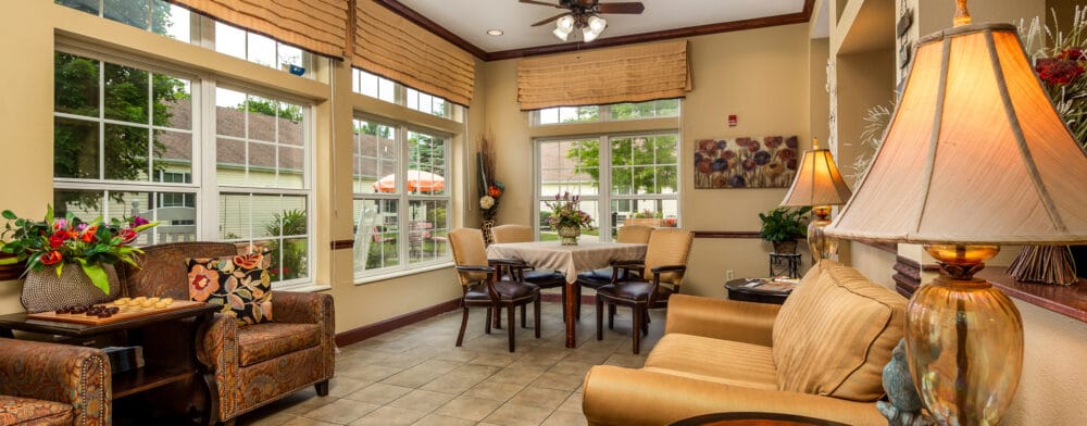 Cozy common area with seating and large windows