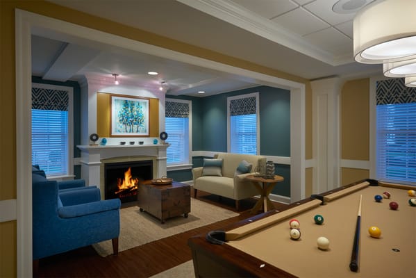 Cozy common area with seating and a fireplace