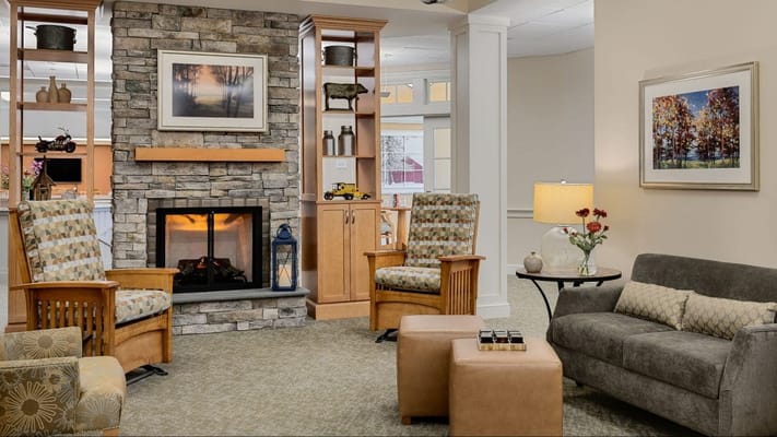 Stylish common area with seating and a fireplace
