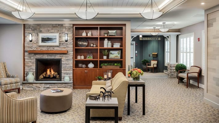 Cozy common area with comfortable seating and a fireplace