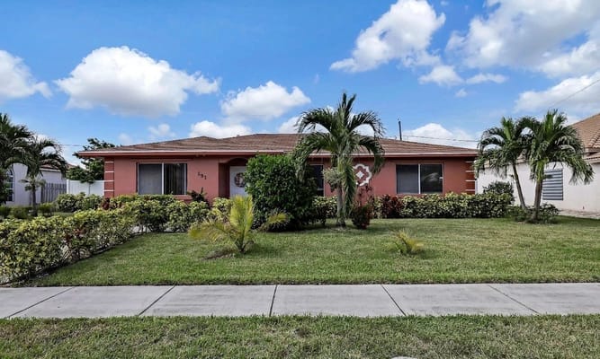 Exterior view of a residential facility with landscaping