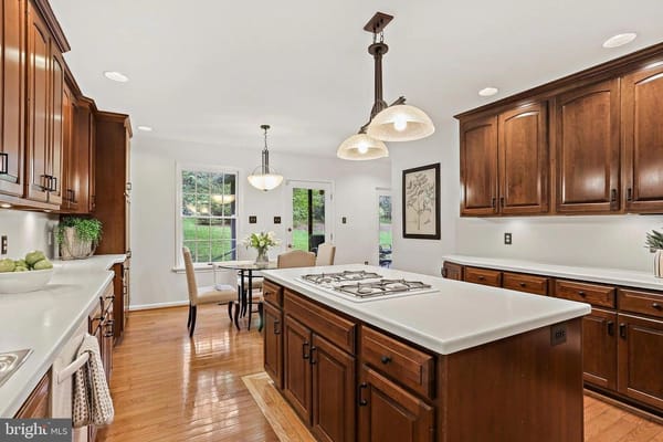 Modern kitchen with wooden cabinets and natural light