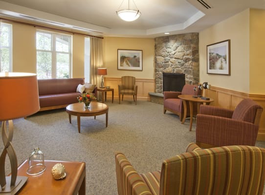 Cozy common area with seating and fireplace