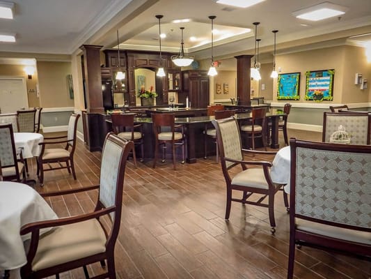 Dining area with stylish seating and bar