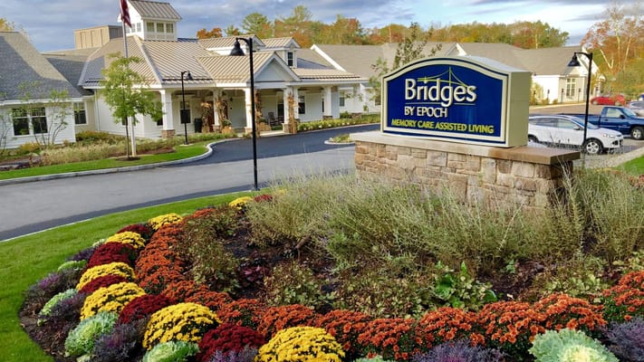 Facility sign with landscaped entrance