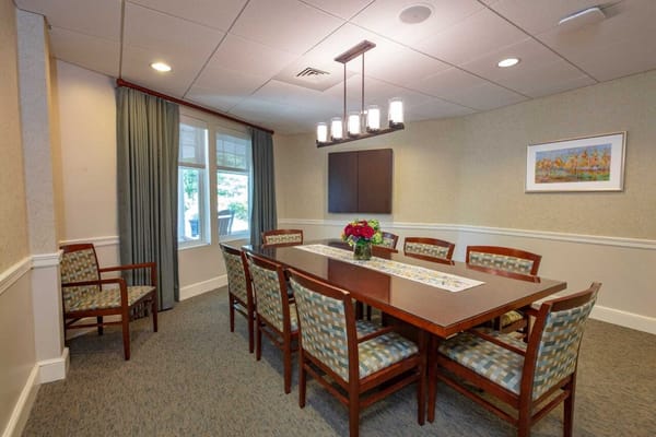 Interior common area with dining table and chairs