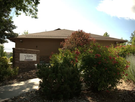 Exterior view of Volante Senior Living with landscaping