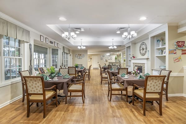 Dining area with tables set for a meal