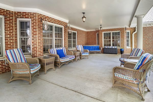 Outdoor seating area with colorful chairs