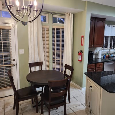 Interior dining area with a round table and chairs