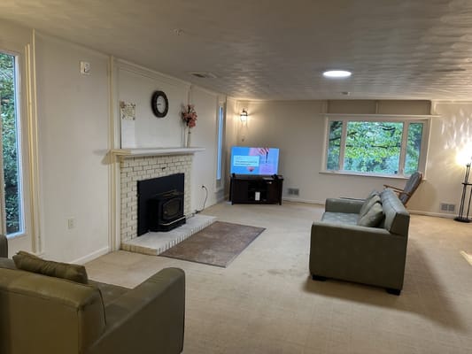 Cozy common area with seating and a television