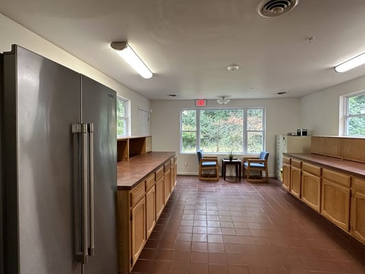 Bright common area with a view and seating