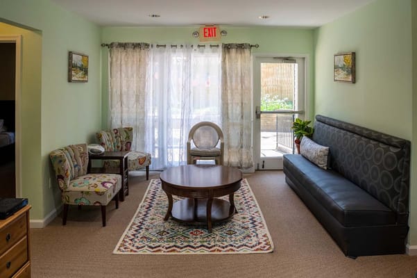 A cozy common area with seating and natural light