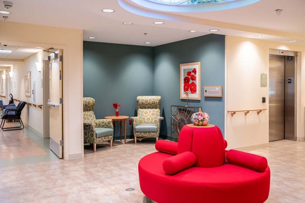 Bright, welcoming common area with colorful seating