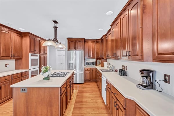 Modern kitchen with wooden cabinets and appliances