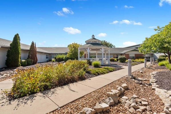 Outdoor garden area with gazebo and walking path