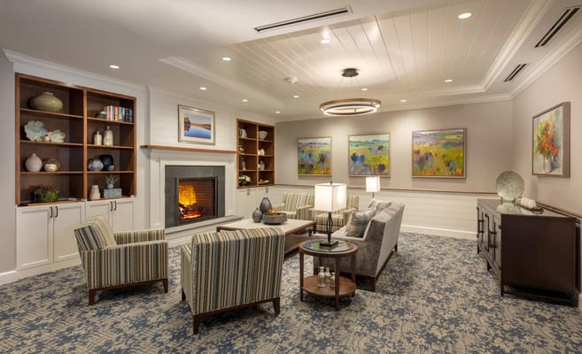 Cozy common area with seating and a fireplace