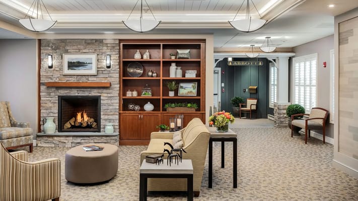 Interior common area with seating and fireplace