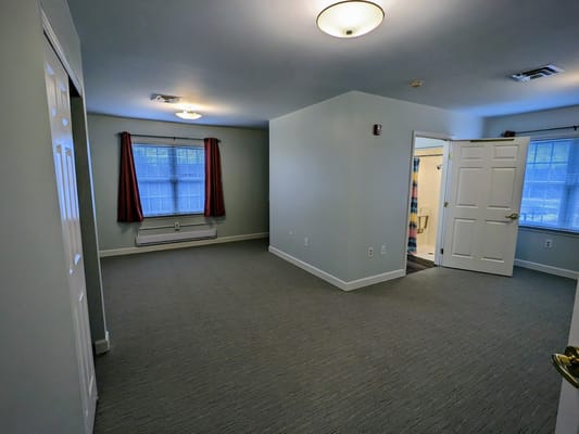 Bright empty resident room with natural light