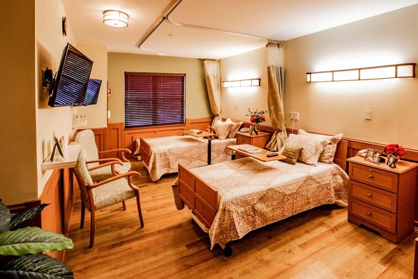 Interior view of a shared resident room with two beds