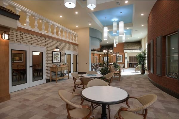 Lobby area with seating and decorative lighting