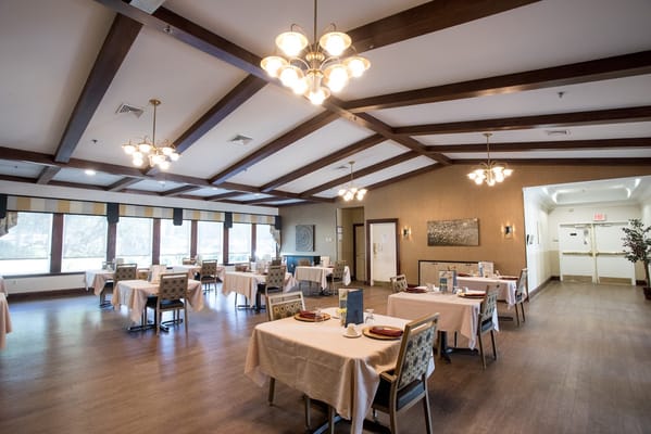Dining room with tables set for meals