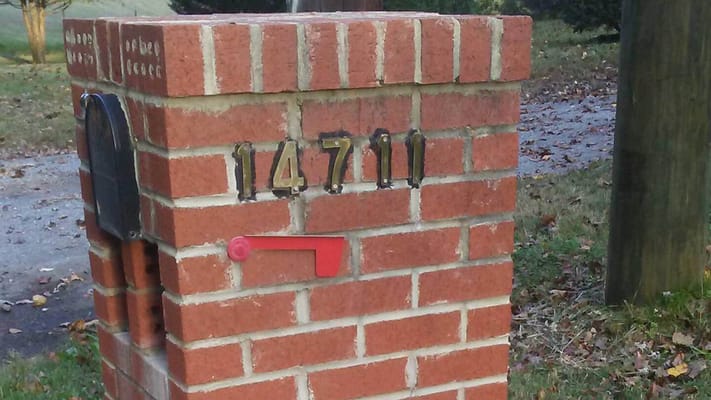 Brick mailbox with address number 14711