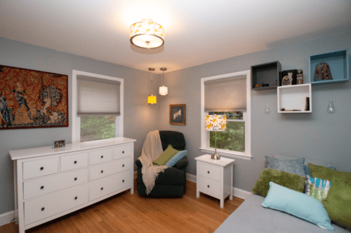 Cozy resident room with comfortable furniture and decor