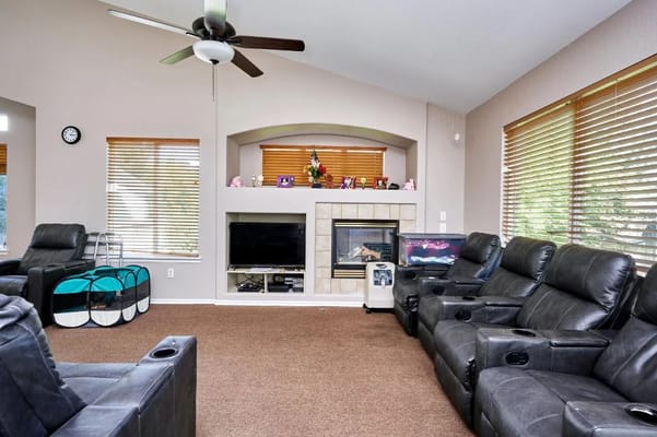 Comfortable common area with seating and a fireplace