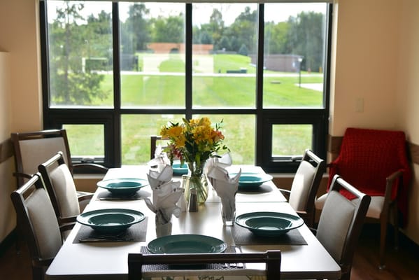 Dining area with table set for a meal